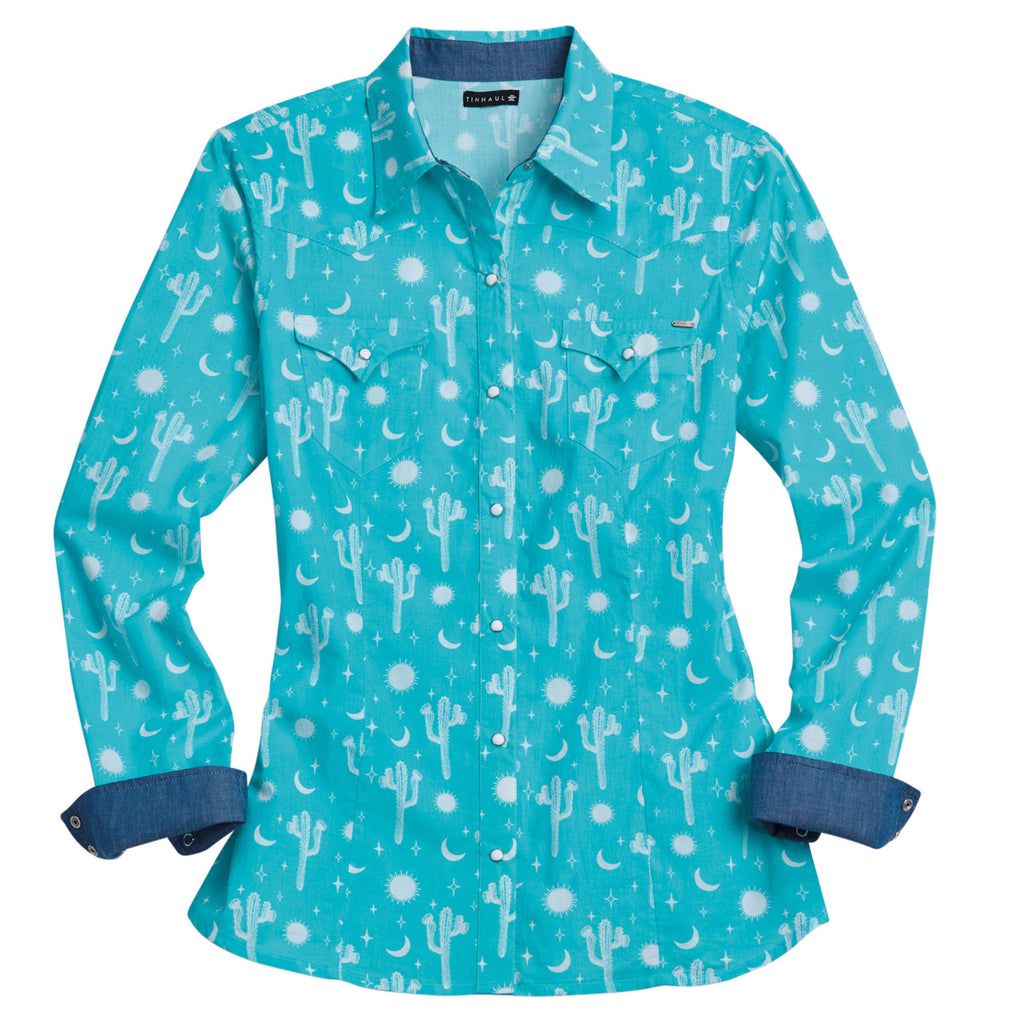 The Tin Haul Womens Collection L/S Shirt (50064312) Print Green by Tin Haul is a regular fit shirt featuring a boho cactus, sun, and moon print, front pockets, and dark blue inner cuffs for stylish detail.