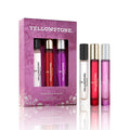 The Tru Western Womens Purse Spray Set - Yellowstone Original, Tornado & Dusk (98324) is a travel perfume trio for women, featuring three stylish bottles in white, red, and pink beside a chic purple floral box.