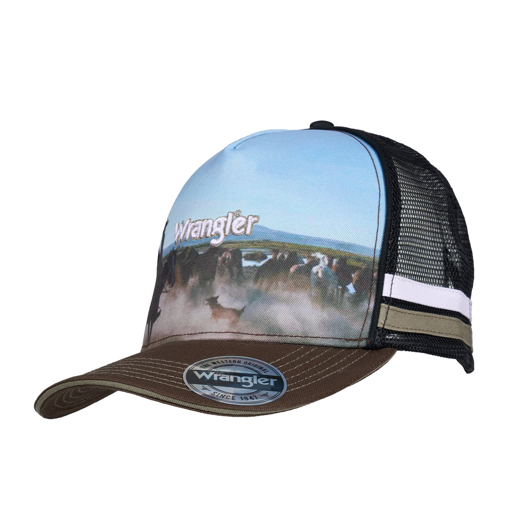 A dark tan Wrangler Evan High Profile Trucker Cap (X6S1951CAP) featuring a brown brim, black mesh back, and a light blue printed front panel with a muster scene and an embroidered Wrangler logo.