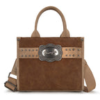 The Wrangler Feature Buckle Crossbody Bag (X6W4912BAG) Tan boasts brown suede PU, tan leather accents, silver studs, a decorative "Wrangler" metal plate, short handles, adjustable shoulder strap, and stylish buckle details.