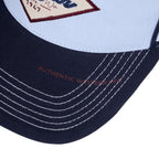 Wrangler Hank High Profile Trucker Cap (X6S1943CAP) Navy/Light Blue Brim detail.