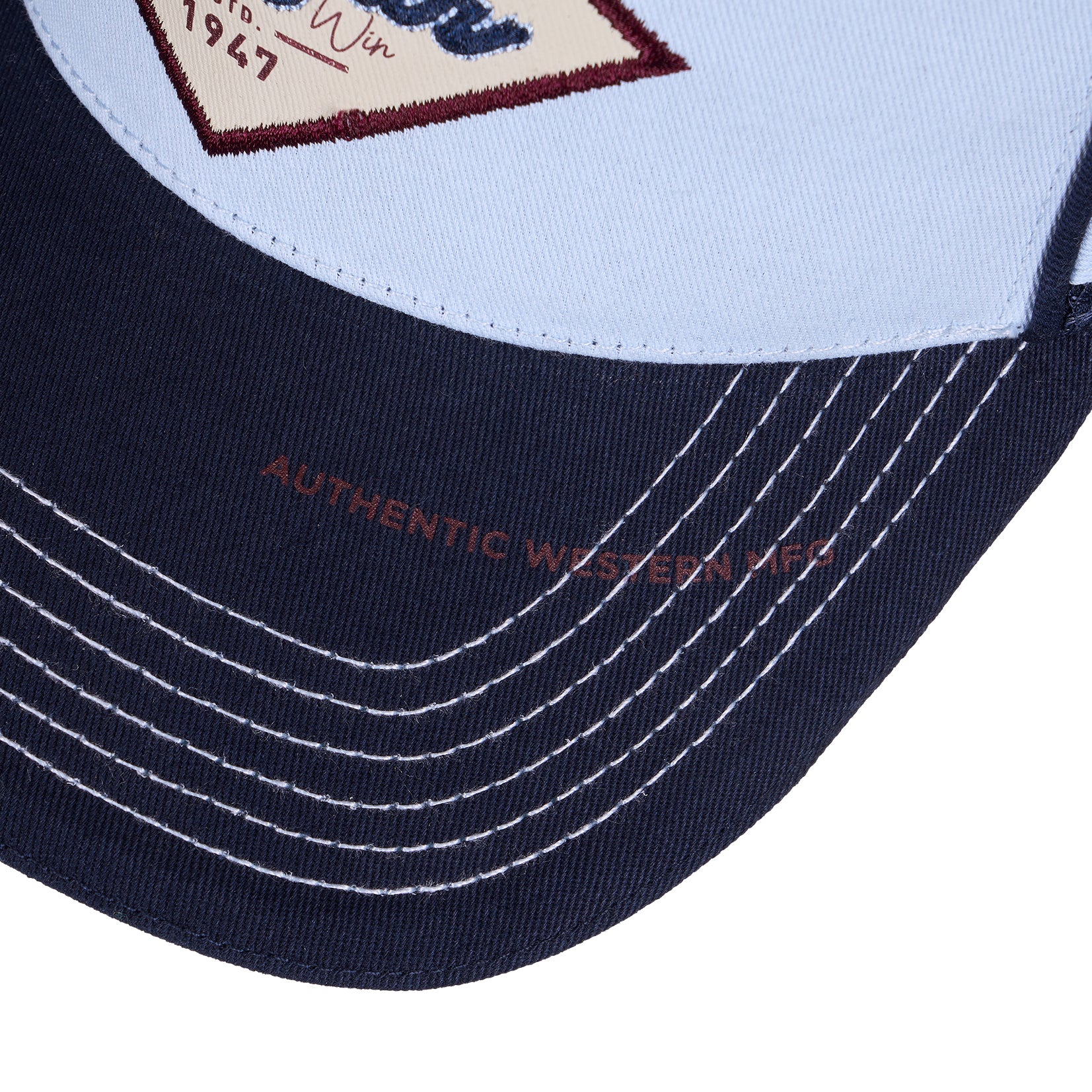 Wrangler Hank High Profile Trucker Cap (X6S1943CAP) Navy/Light Blue Brim detail.