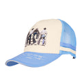 A light blue and cream Wrangler Josie High Profile Trucker Cap (X6S2943CAP) featuring a western-themed graphic print on the front panel and cream embroidered text on the brim.
