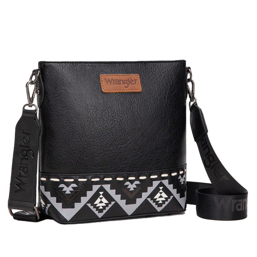 The Wrangler Lana Aztec Print Crossbody Bag (X6W4914BAG) in black features an adjustable strap, southwestern geometric pattern at the base, and a brown leather Wrangler patch on the front.