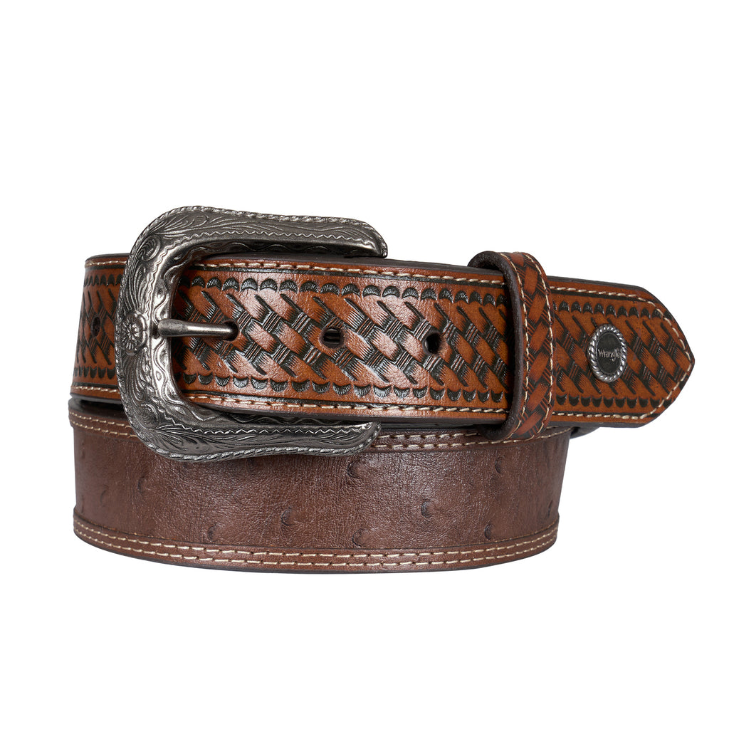 A tan Wrangler Leonard Belt (X6S1909BLT) with a basket weave embossed pattern, featuring a silver-toned engraved buckle and a silver concho on the tip, shown on a white background.