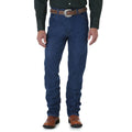 A person wearing a dark green shirt, a brown belt with a large buckle, brown cowboy boots, and Wrangler Mens Cowboy Cut Slim Fit Pre Washed Jeans (936PWD) Prewashed Indigo by Wrangler, shown from shoulders to feet against a white background.