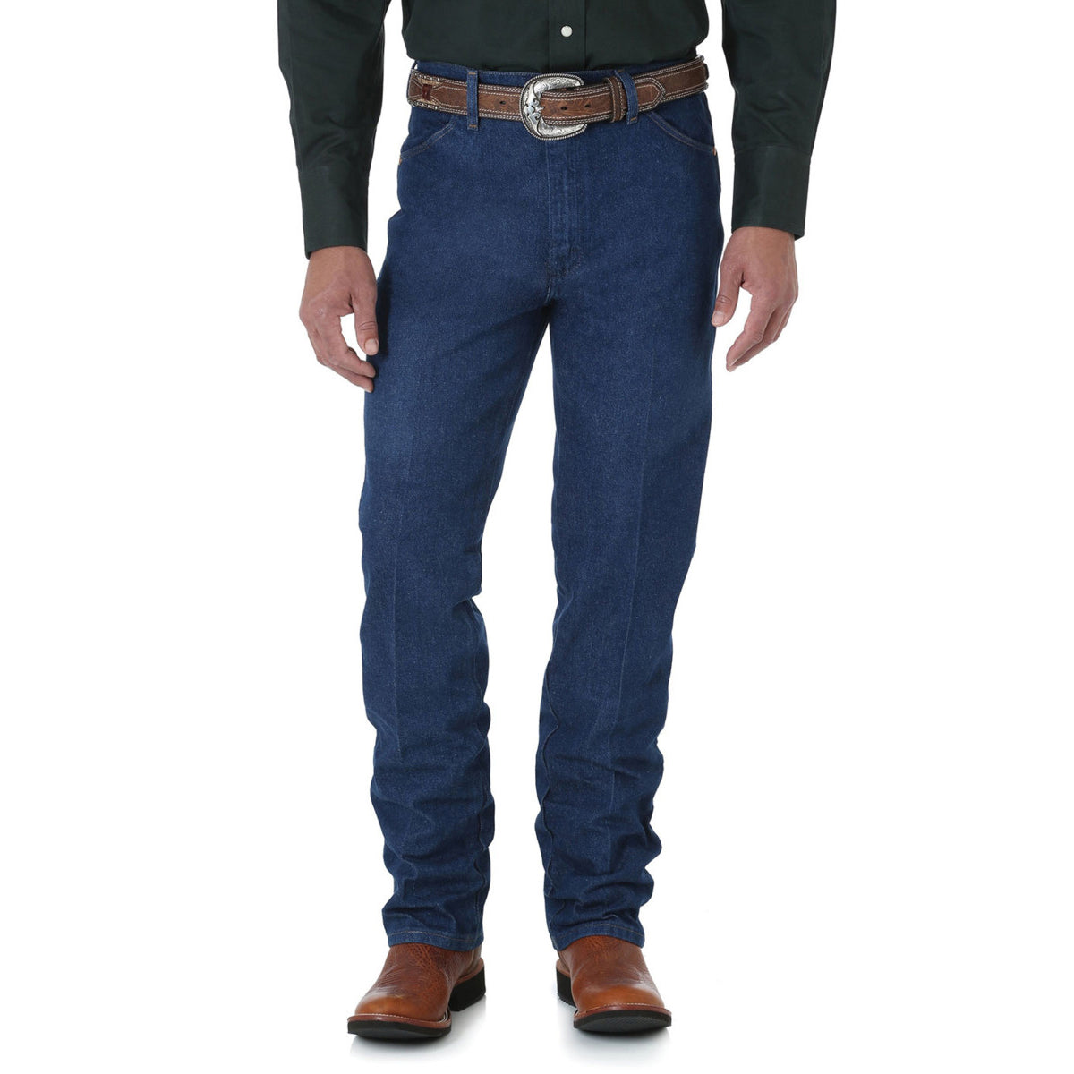 A person wearing a dark green shirt, a brown belt with a large buckle, brown cowboy boots, and Wrangler Mens Cowboy Cut Slim Fit Pre Washed Jeans (936PWD) Prewashed Indigo by Wrangler, shown from shoulders to feet against a white background.