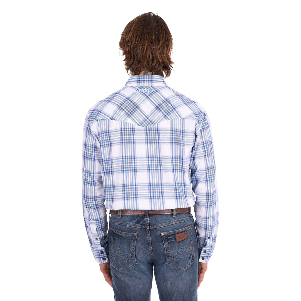 A man wearing a light blue, royal blue and white Wrangler Men's Eric long-sleeve western-style plaid button-down Shirt (X6S1111667) paired with dark blue jeans, set against a plain white background.