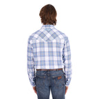A man wearing a light blue, royal blue and white Wrangler Men's Eric long-sleeve western-style plaid button-down Shirt (X6S1111667) paired with dark blue jeans, set against a plain white background.