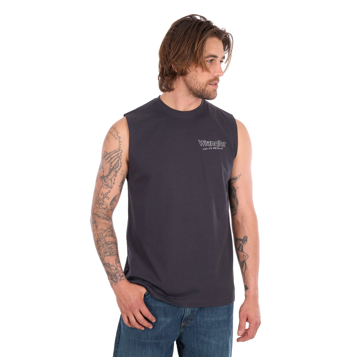 A man wearing a Wrangler Mens Paul Muscle Tank (XCP1572700) in Charcoal with a pair of denim jeans.