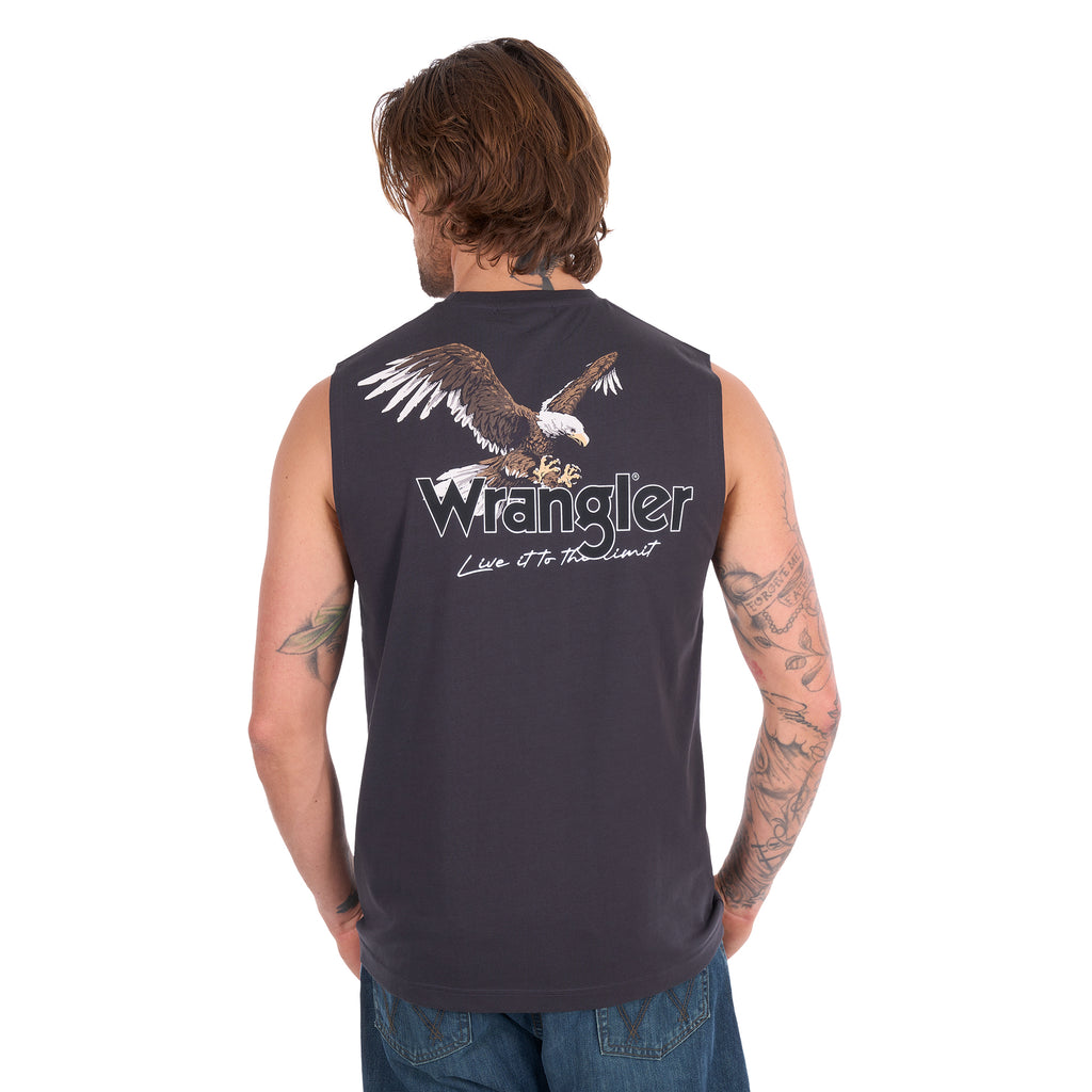 A man with his back to the camera wearing a Wrangler Men's Paul Muscle Tank with a Wrangler logo and a large print of an eagle on it (XCP1572700) in Charcoal with a pair of denim jeans.