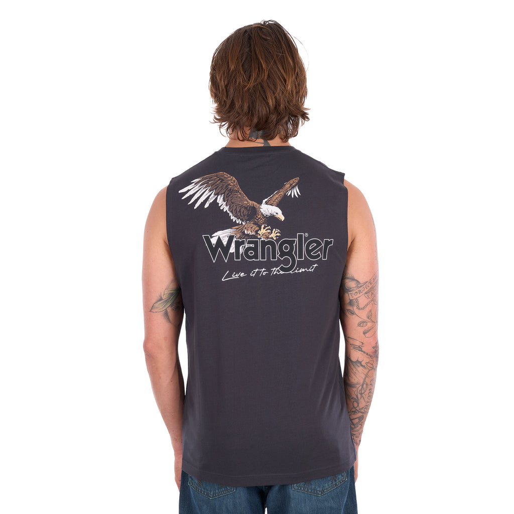 A man with his back to the camera wearing a Wrangler Men's Paul Muscle Tank with a Wrangler logo and a large print of an eagle on it (XCP1572700) in Charcoal with a pair of denim jeans.