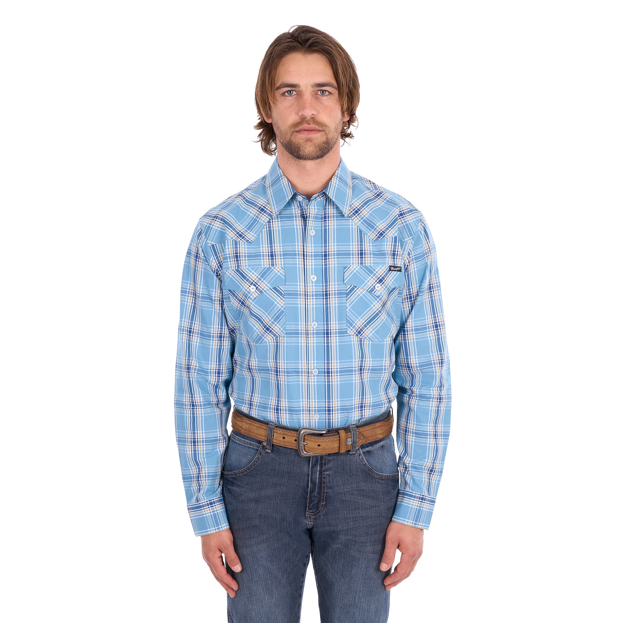 A man wearing a teal and tan Wrangler Men's Zak L/S Shirt (X6S1111668) with a brown belt and dark blue jeans, standing against a solid white background.