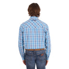 A man wearing a teal and tan Wrangler Men's Zak L/S Shirt (X6S1111668) with a brown belt and dark blue jeans, standing against a solid white background.