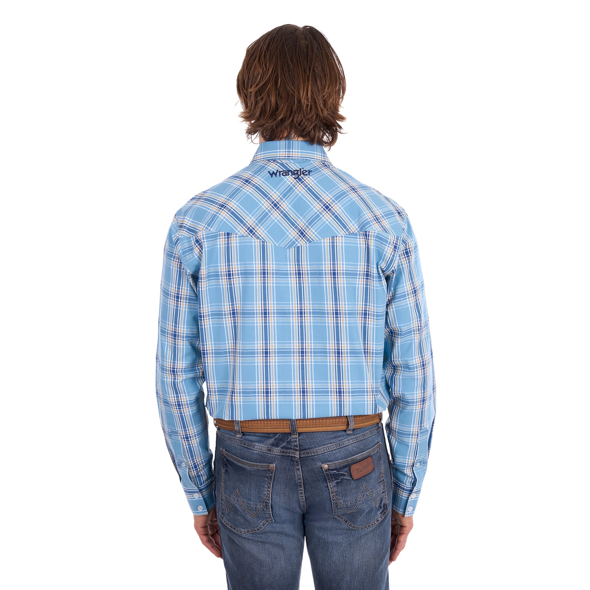 A man wearing a teal and tan Wrangler Men's Zak L/S Shirt (X6S1111668) with a brown belt and dark blue jeans, standing against a solid white background.