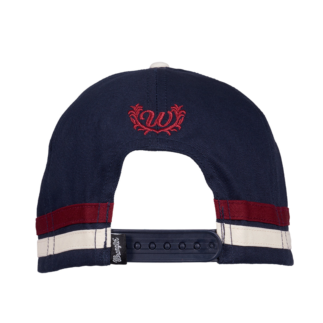 Back view of a navy and cream Wrangler Nora High Profile Full Back Cap (XCP2947CAP) with a red embroidered 'W' logo on the crown, red and white side stripes, and a snapback closure.