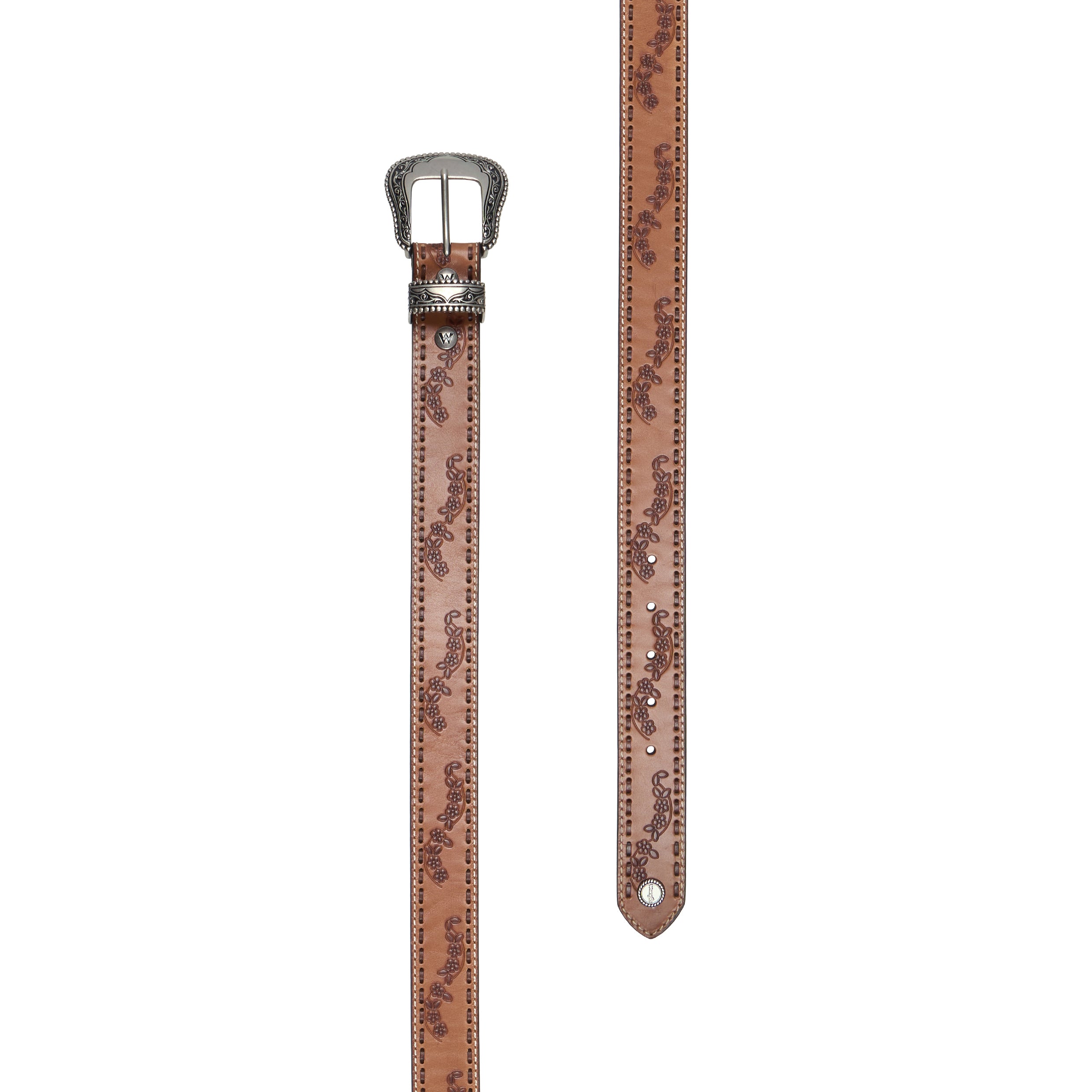 A light tan, floral embossed leather Wrangler Silvie Belt (X6S2920BLT) with leather lacing, featuring an engraved silver-tone buckle, matching keeper and logo concho photographed in flat lay on a white background.