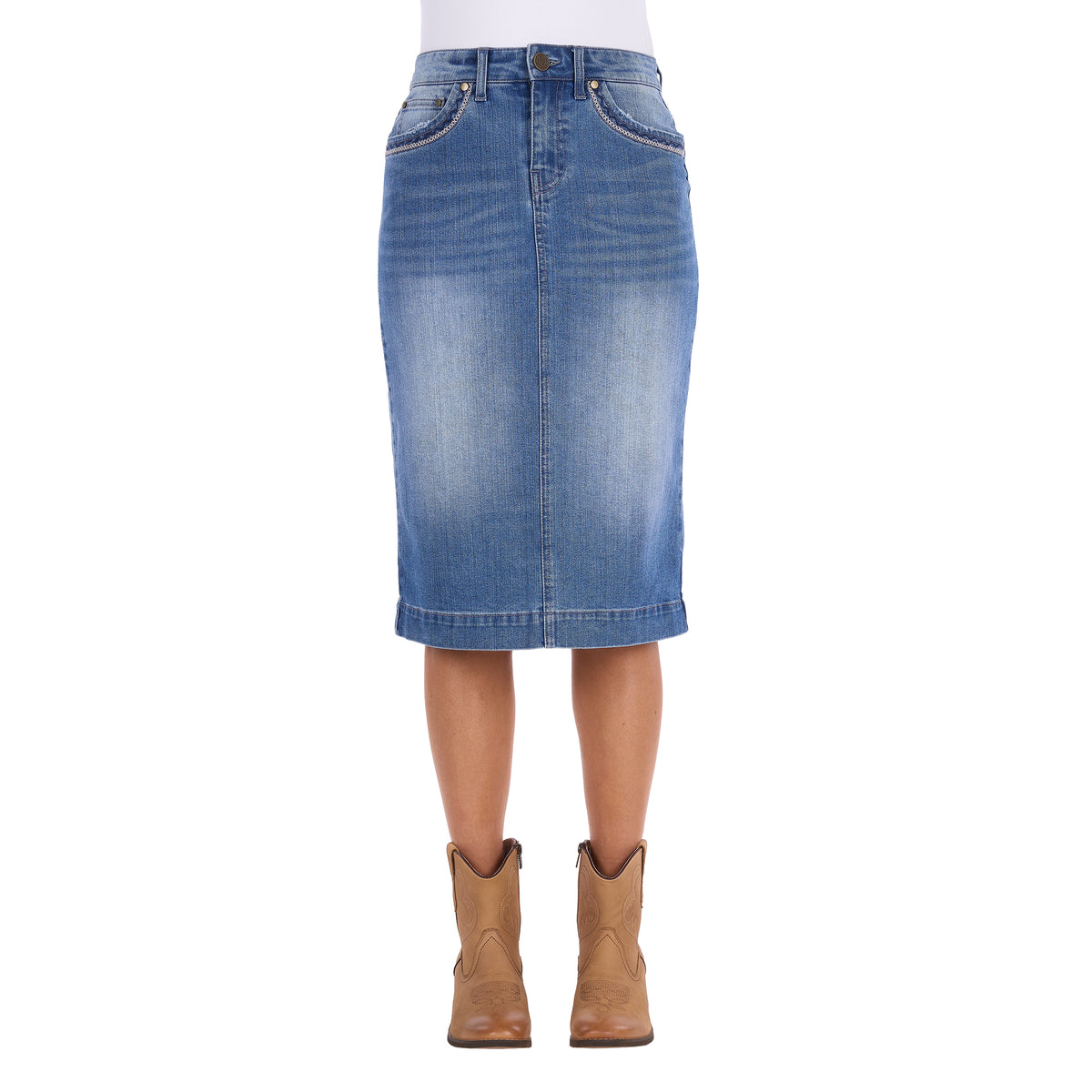 A Wrangler Women's Emmie Denim Skirt (X6S2410724) in light Kora Blue with embroidered pockets shown on a model from the waist down, paired with tan cowboy boots against a plain white background.