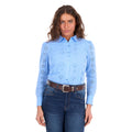 A woman modelling a cornflower blue Wrangler Women's Fleur Long Sleeve Shirt (X6S2104600) with embroidered Aztec inspired patterns, paired with dark blue jeans and a tan Wrangler Molly Belt (XCP2919BLT), against a plain white background.