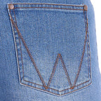 Close-up of the back pocket of faded blue Wrangler Women's Gigi Mid Rise Denim Shorts (XCP2411717), showing the characteristic double-stitched 'W' design and brown contrast stitching.