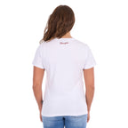 A woman viewed from the back wearing a Wrangler Women's Gwen (X6S2598635) White t-shirt with a small red script logo on the upper back, paired with blue jeans against a plain white background.