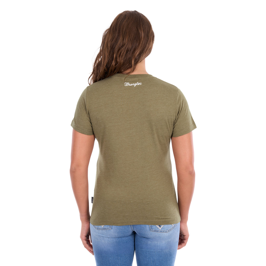 A woman viewed from the back wearing a Wrangler Women's Lucy Tee (XCP2598633) Khaki Marle with  a Wrangler script logo on the back neck and blue jeans, set against a plain white background.