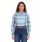 A woman modelling a pink and teal Wrangler Women's Luisa Long Sleeve Shirt (X6S2100607), paired with blue jeans and a tan Wrangler Siara Western Belt (X6S2916BLT), against a plain white background.
