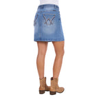 A faded blue Wrangler Women's Maisy Denim Skirt (XCP2409723) with decorative embroidery on the back pockets, shown on a model from the rear wearing tan cowboy boots against a white background.