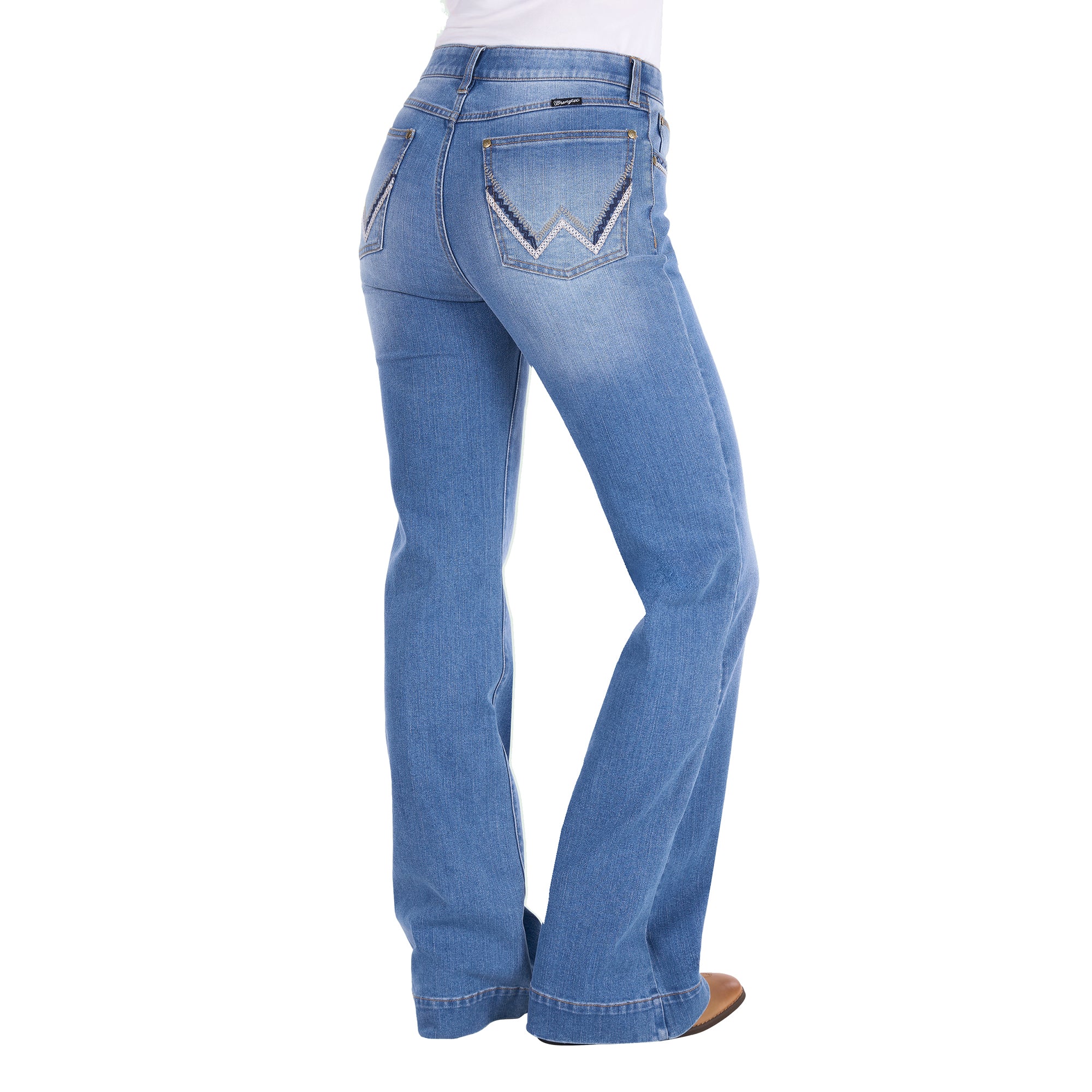 3-4 rear view of a person wearing light blue Wrangler Women's Margo Trouser Jeans Willow (XCP2253710) with a straight-to-flare leg and decorative contrast stitching on the back pockets, shown against a plain white background.