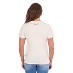 A woman from behind modelling a Wrangler Women's Nora Short Sleeve Tee (XCP2598636) in cream, featuring a red script back neck Wrangler logo, paired with blue jeans against a plain white background.
