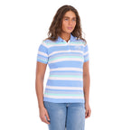 A woman modelling a Wrangler Women's Sloan Short Sleeved Polo Shirt (X6S2514625) with horizontal light blue, white, and pale mint stripes, paired with blue jeans against a plain white background.