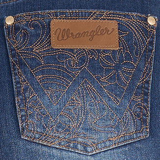Close-up of an old indigo blue denim Wrangler Women's Summer High Rise Denim Shorts (XCP2412718)  back pocket with intricate gold-toned embroidery, a brown leather patch, and the Wrangler logo.