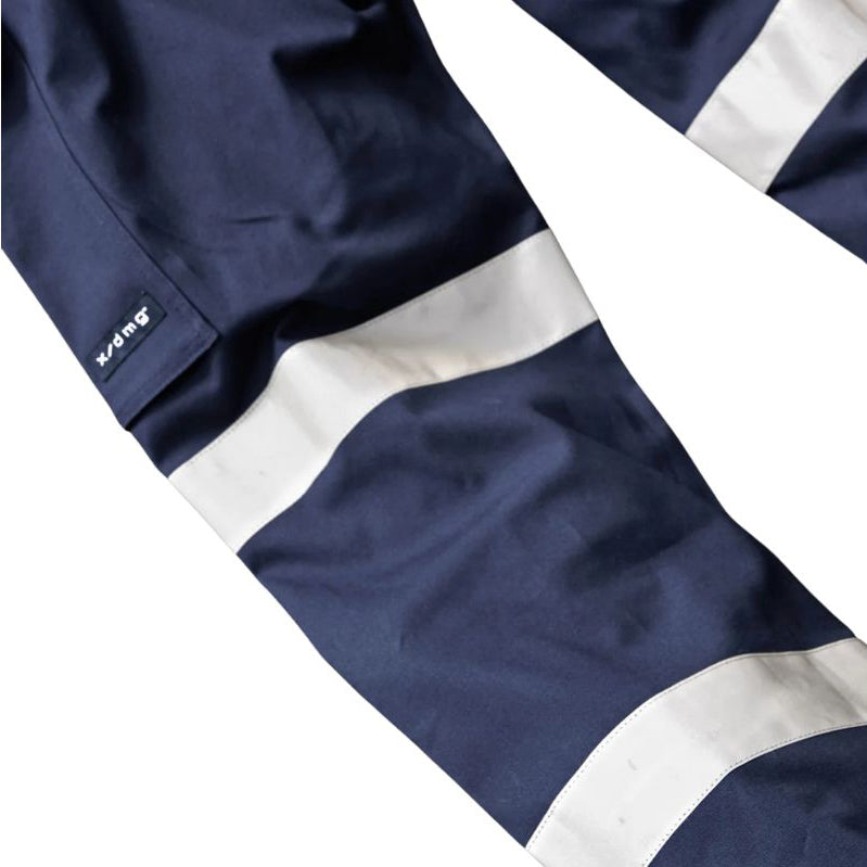 Close up pocket and tape detail on a pair of navy blue x/dmg Men's UP-1T Cargo Taped Work Pants (XU02506025) shown against a plain white background.